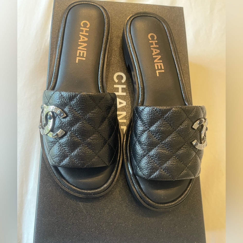 Brand new, never worn CHANEL slides